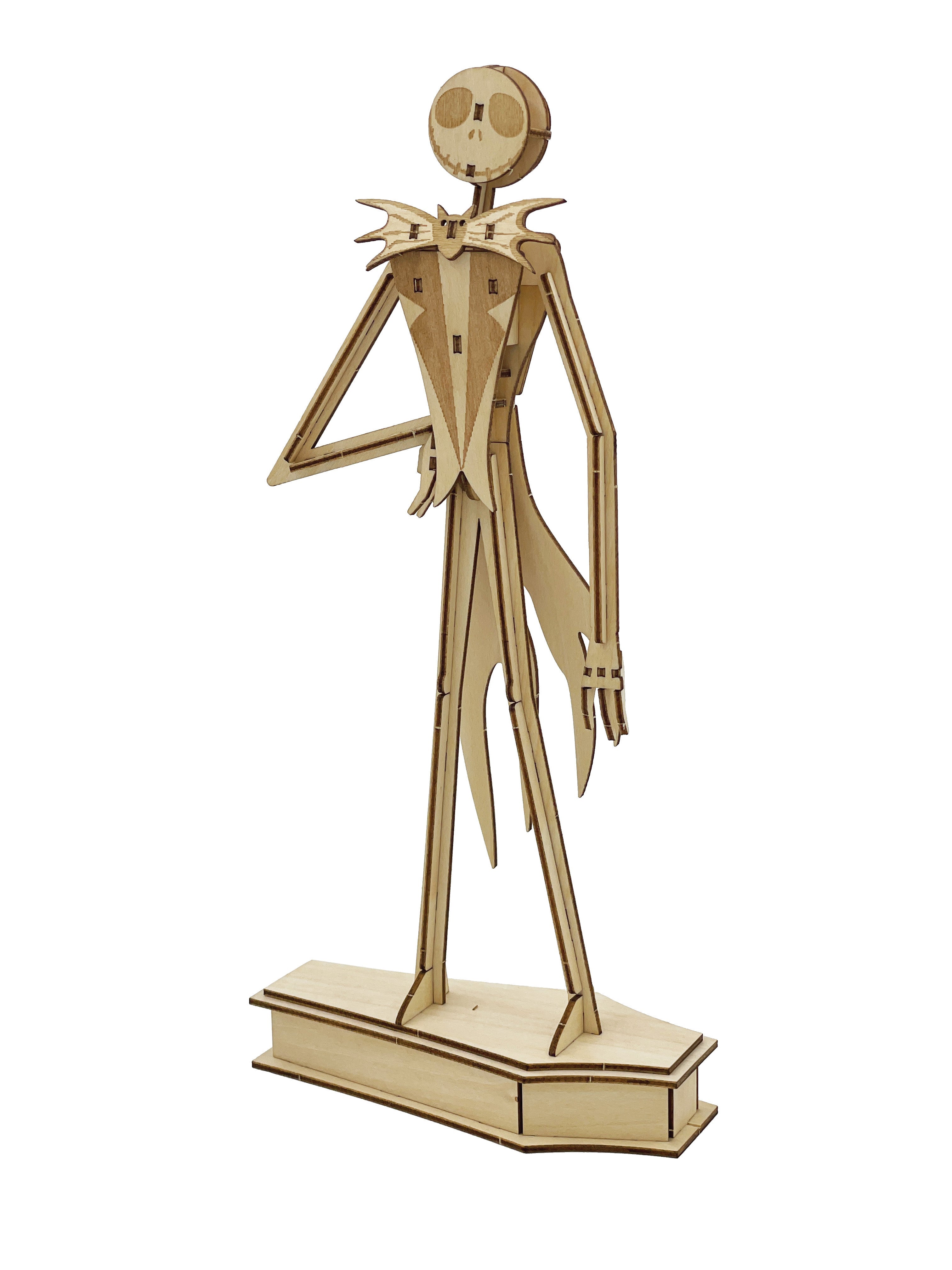 IncrediBuilds Nightmare Before Christmas Jack Skellington 3D wood model kit with instruction book, featuring detailed wood pieces.