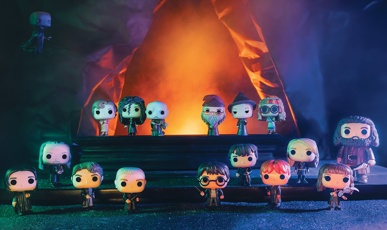 Inside view of "The World of Funko: Harry Potter" hardcover book by Insight Editions, showcasing colorful Harry Potter-themed illustrations.
