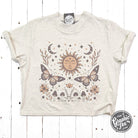The Graphic Tee 90's Vibes celestial mid-length crop top with drop sleeves, featuring vibrant 90s-inspired celestial design.