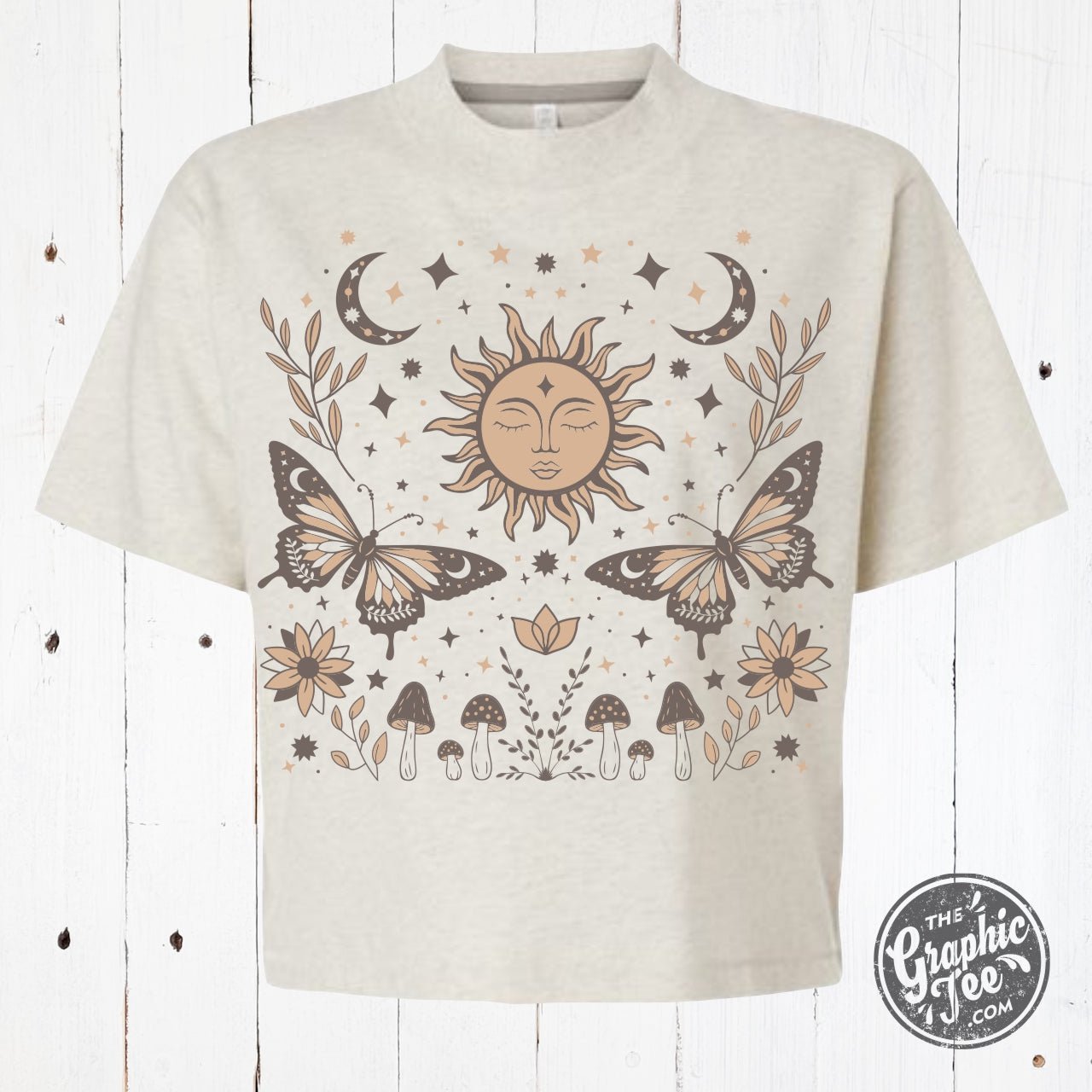 The Graphic Tee 90's Vibes celestial mid-length crop short sleeve tee with drop sleeves and vibrant 90s-inspired design.