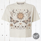 The Graphic Tee 90's Vibes celestial mid-length crop short sleeve tee with drop sleeves and vibrant 90s-inspired design.