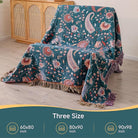 CozyNest Decor boho large cotton throw blanket with tassels, ultra-soft rustic quilt for sofa, bed, or travel decor.