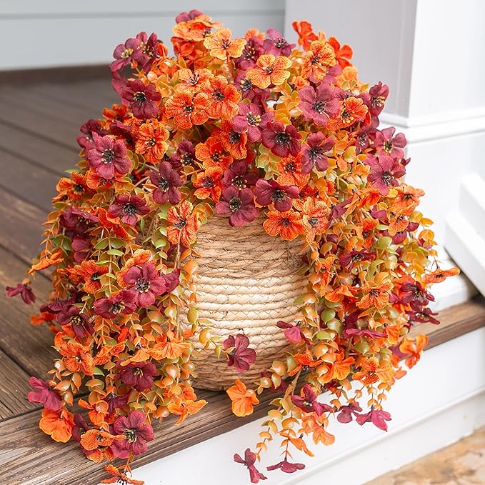 CozyNest Decor artificial fall flowers in light orange and brown daisy designs, ideal for outdoor porch, patio, or balcony decor.