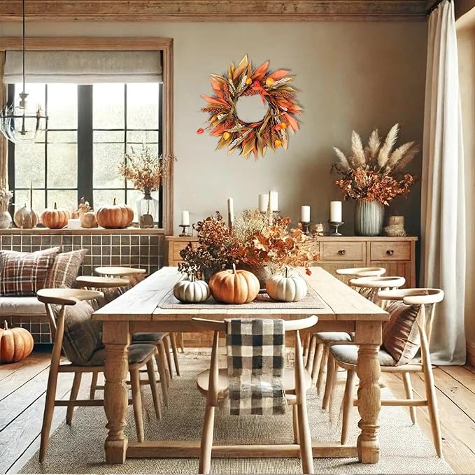 Rustic 24-inch fall corn husk and berry wreath with orange, yellow, and brown accents, perfect for farmhouse front door decor.