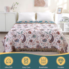 CozyNest Decor boho large cotton throw blanket with tassels, ultra-soft rustic quilt for sofa, bed, or travel decor.