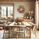 Handmade 24-inch fall wreath with artificial autumn leaves, pinecones, berries, and wheat for farmhouse door or wall decor.