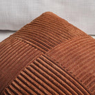 Rust-colored boho throw pillow covers by CozyNest Decor, 18x18 inch textured corduroy patchwork for couch or sofa decor.