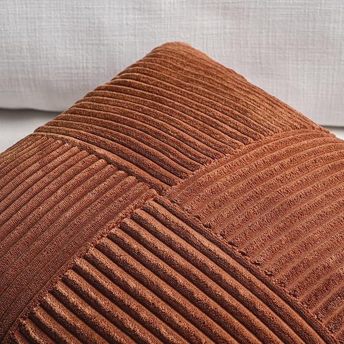 Rust-colored boho throw pillow covers by CozyNest Decor, 18x18 inch textured corduroy patchwork for couch or sofa decor.