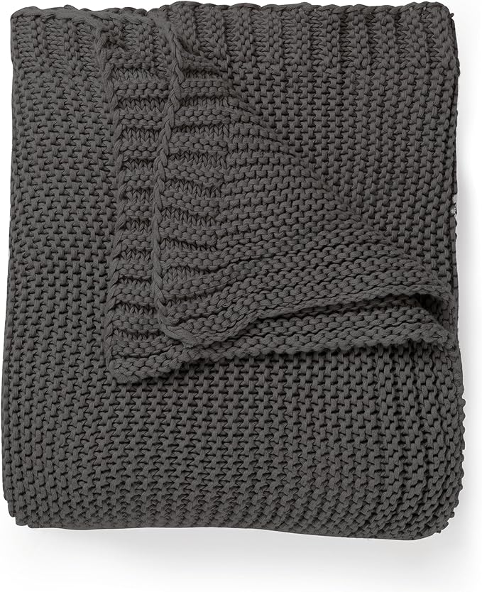CozyNest Decor MakeMake Organics organic cotton throw blanket in charcoal grey with soft, knit texture, perfect for couch or bed.