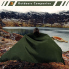 CozyNest Decor Latitude Zero alpaca wool camping throw blanket in army green, ultra-soft, breathable, and hypoallergenic outdoor throw.