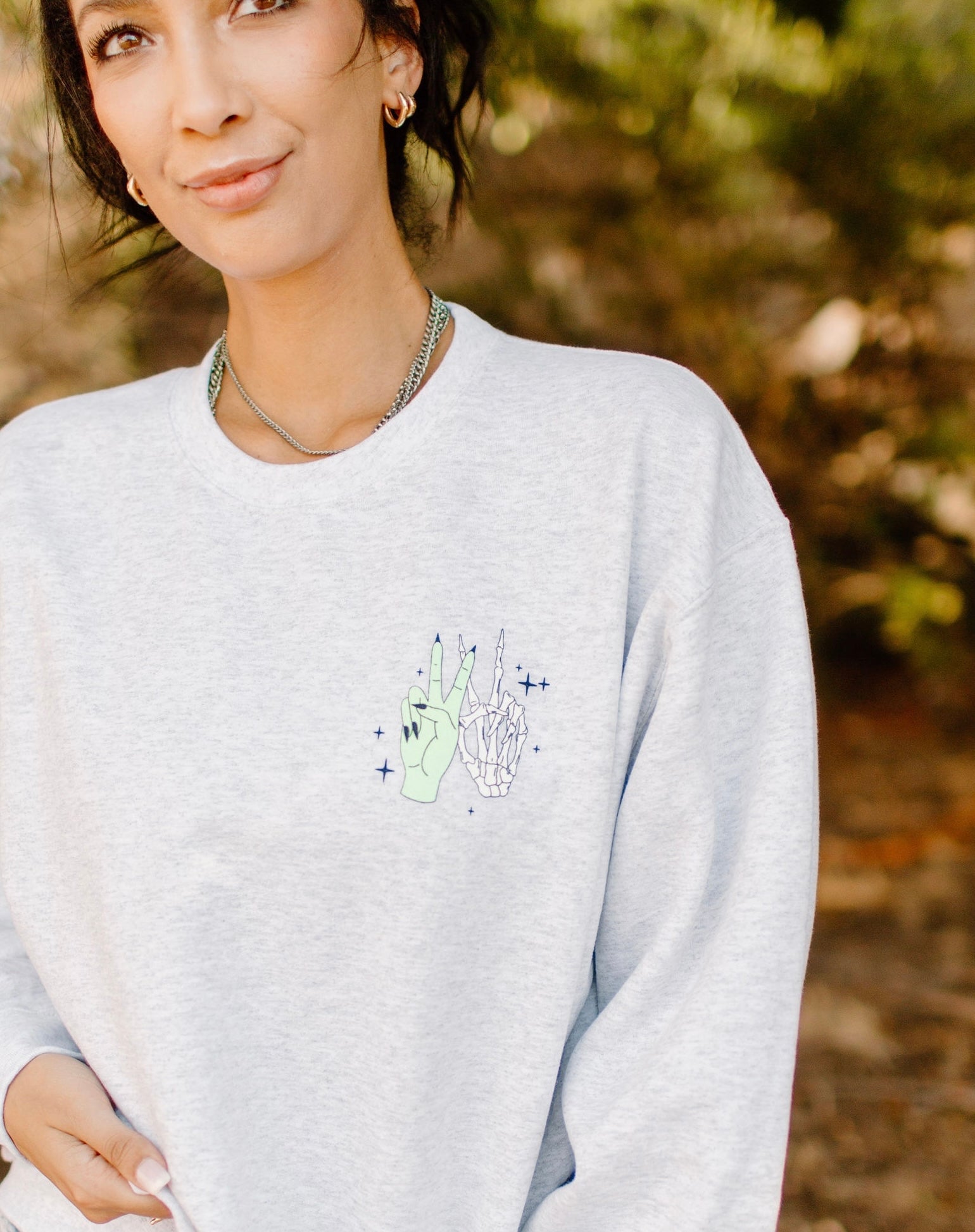 Vibin' with My Demons graphic sweatshirt by Shop Karma Tees, featuring dark, artistic design on black fabric.