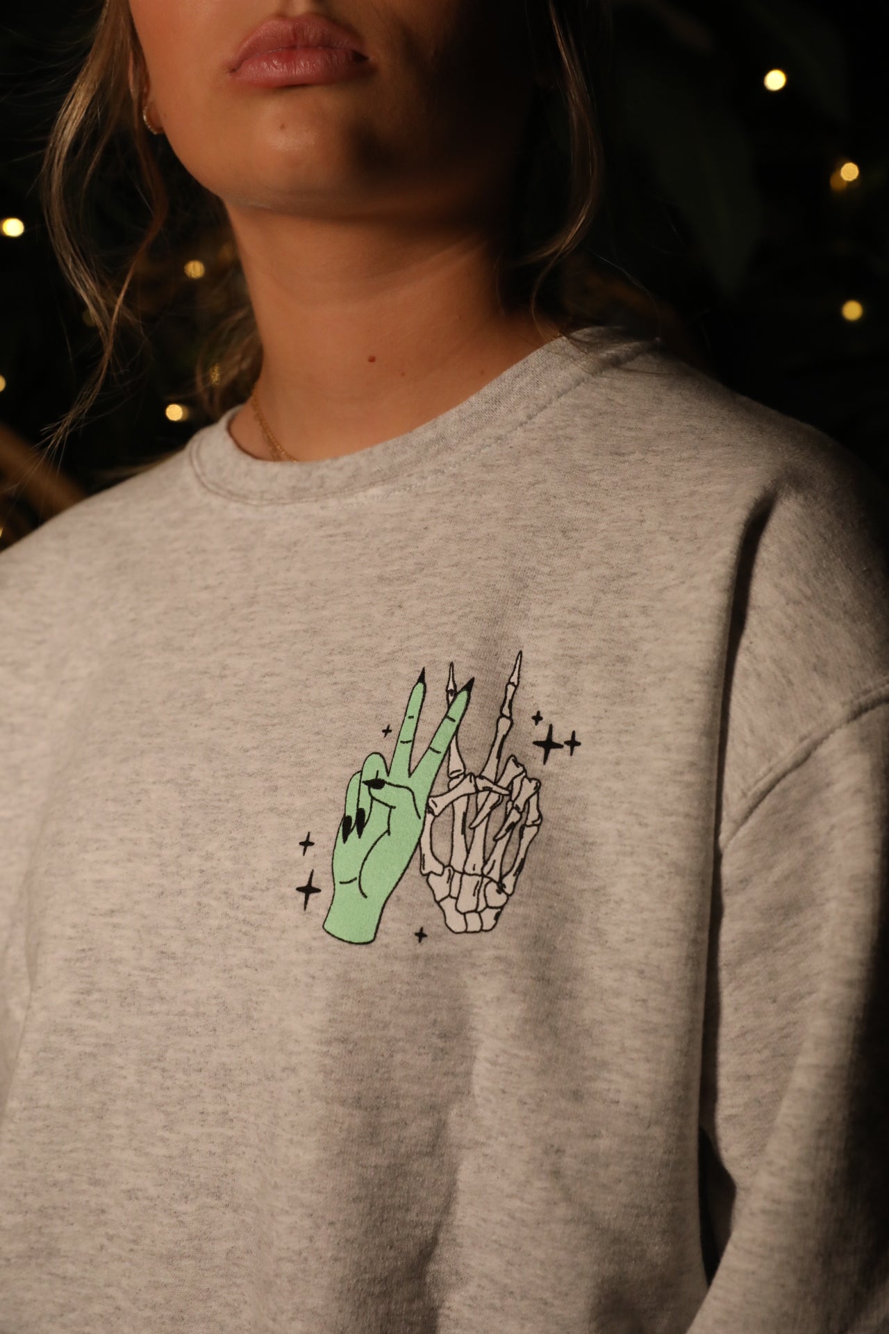 Black graphic sweatshirt from Shop Karma Tees featuring "Vibin' with My Demons" design and a comfortable, casual fit.