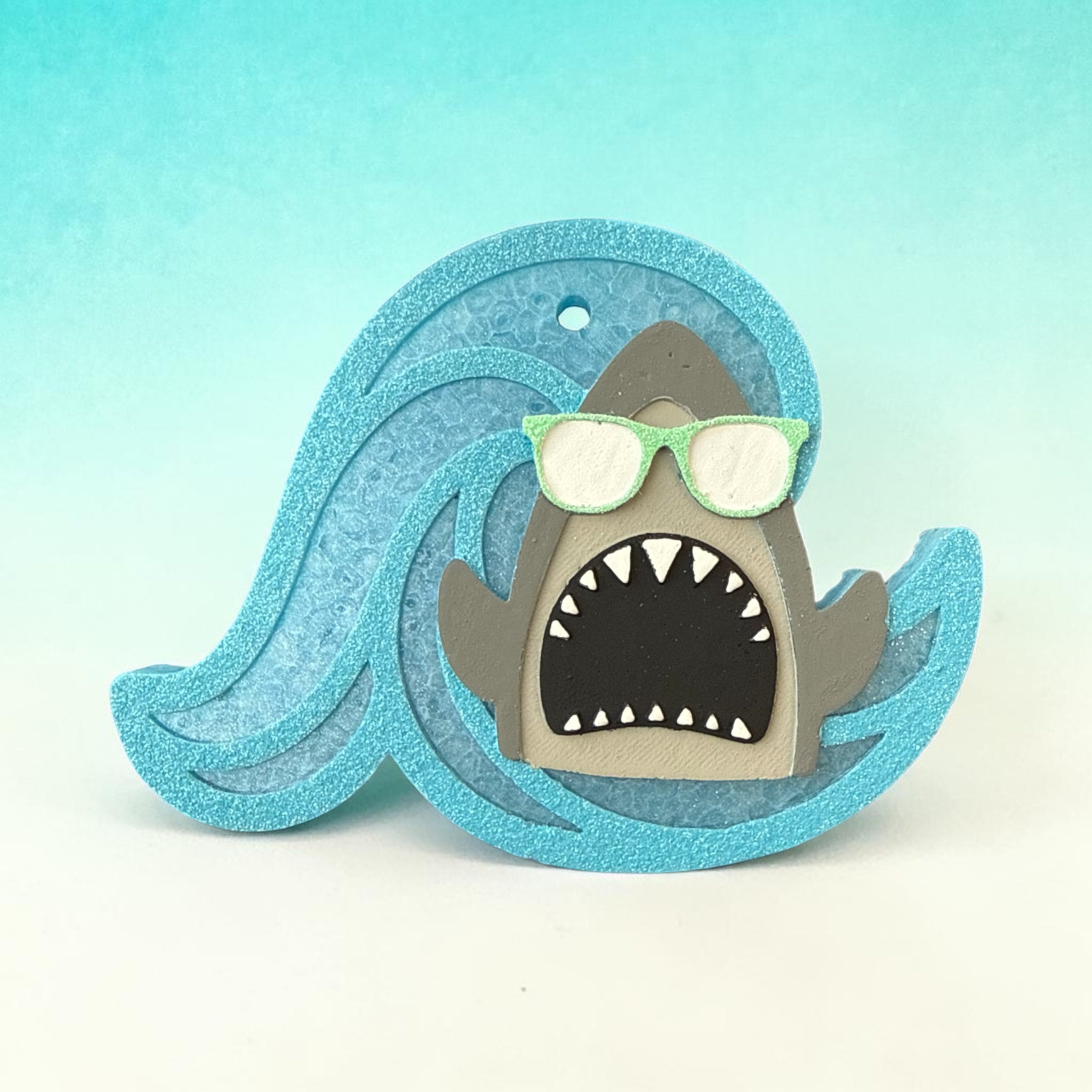 Bug & Bean Freshies I Saw A Fin scented air freshener in a colorful, fish-shaped design for freshening up spaces.