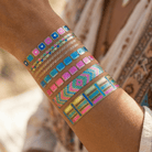 Temporary bracelet tattoo pack by The Bullish Store showing 8 individual tattoo designs on a single sheet.