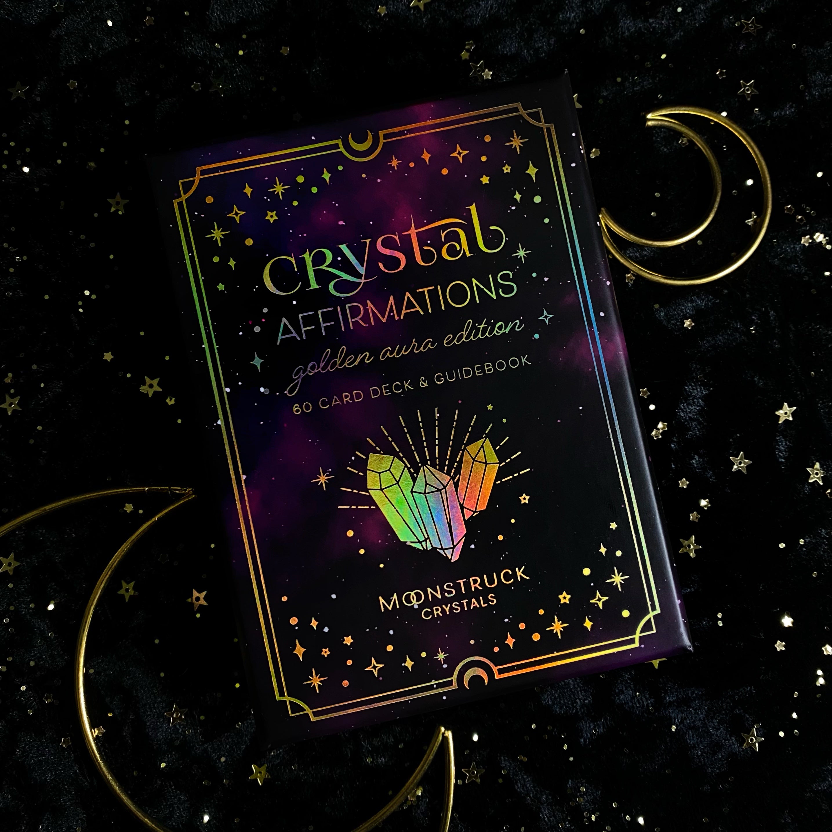 Gold Crystal Affirmations© Golden Aura Edition card deck by Moonstruck Crystals, featuring beautifully designed affirmation cards with gold accents.