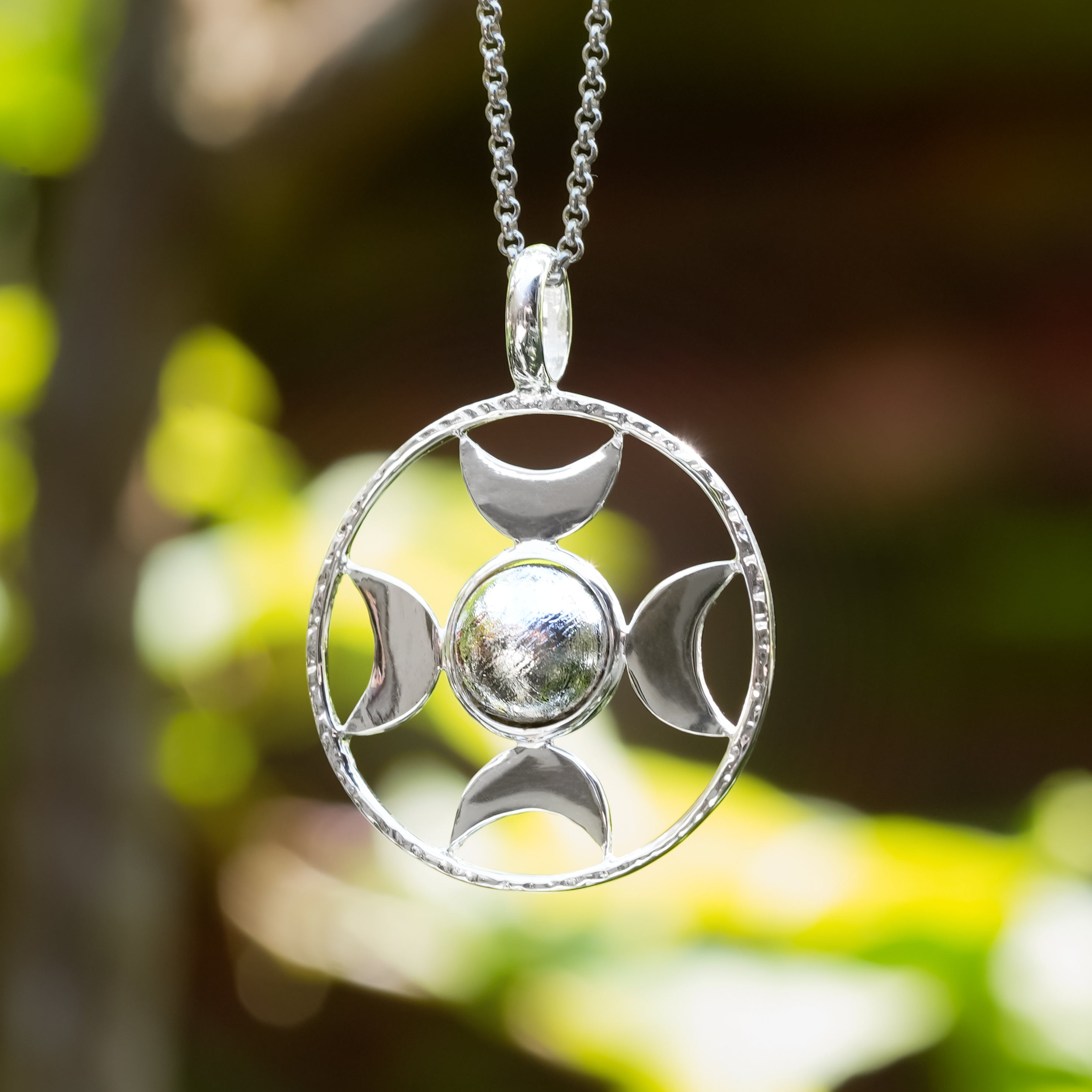 Large Sterling Silver Crescent Moon pendant featuring Starborn Sphere Gemstones and a directional design, crafted by Starborn Creations.