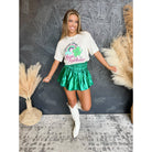 Bright neon rainbow shirt by The Bullish Store, casual apparel in sizes small to 2XL, featuring vibrant rainbow design.