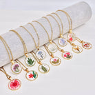 Dried flowers in an irregular round pendant necklace by The Bullish Store, nature-inspired fashion jewelry for nature lovers
