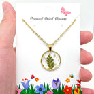 Dried flowers floral round pendant necklace featuring a nature-inspired design, made by The Bullish Store, perfect for nature lovers.