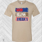 Black graphic tee from Anchored Grace Boutique with "God Bless America" design and patriotic flag imagery.