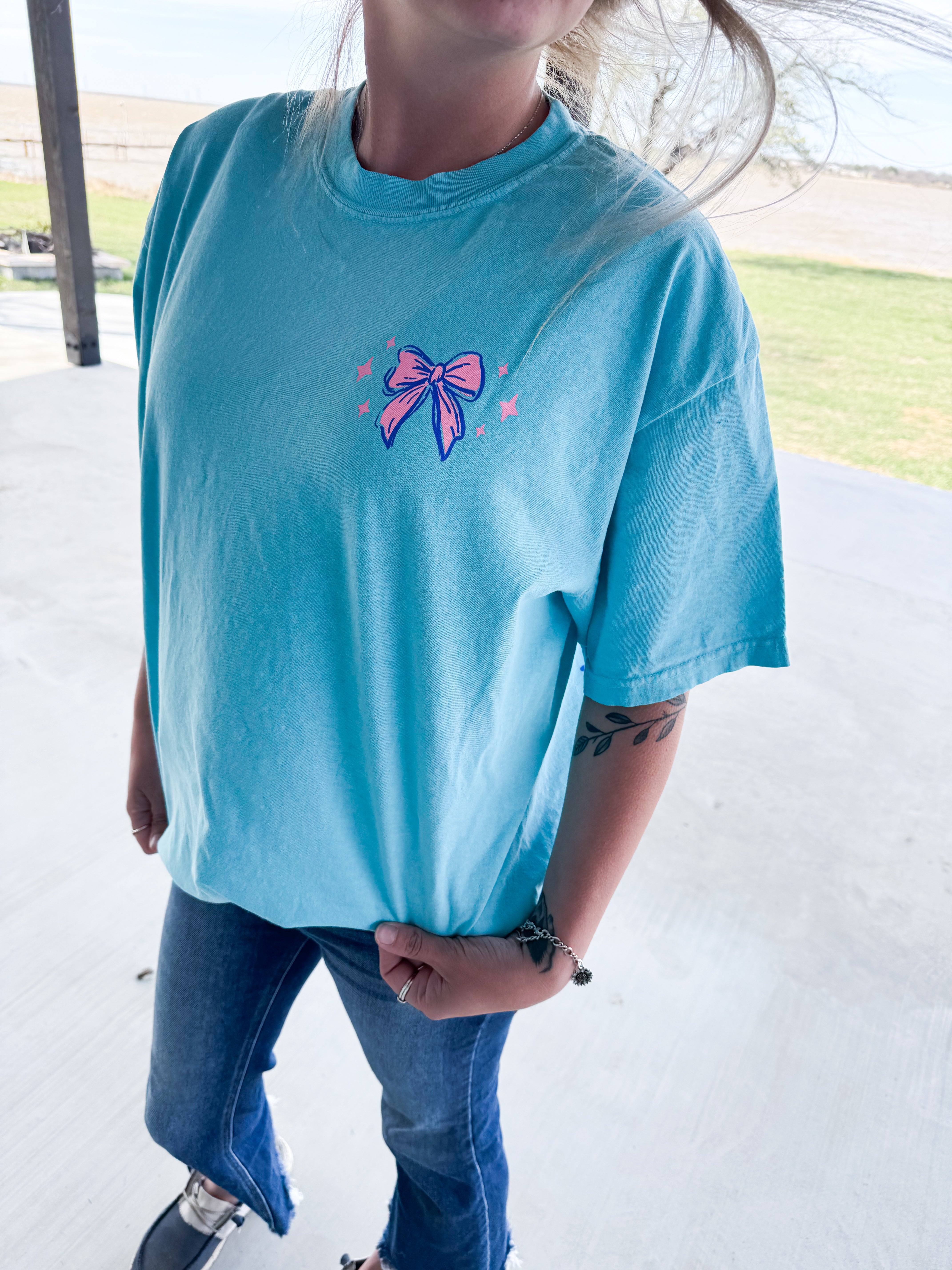Black cotton t-shirt from Shop Karma Tees featuring the humorous "I’m Fine, But Yall Need Therapy" graphic print.