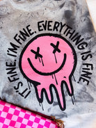 It's Fine Smiley graphic T-shirt from Shop Karma Tees featuring a cheerful yellow smiley face design.
