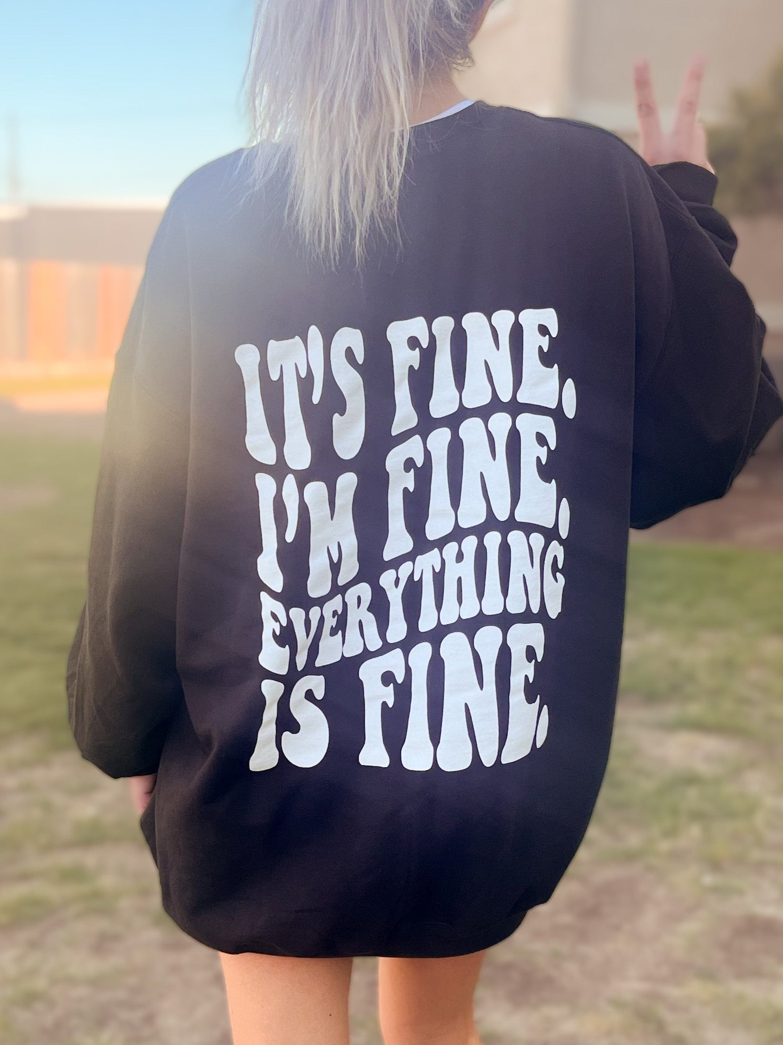 It's Fine, I'm Fine graphic crewneck sweatshirt by Shop Karma Tees featuring a casual design and printed text on soft fabric.