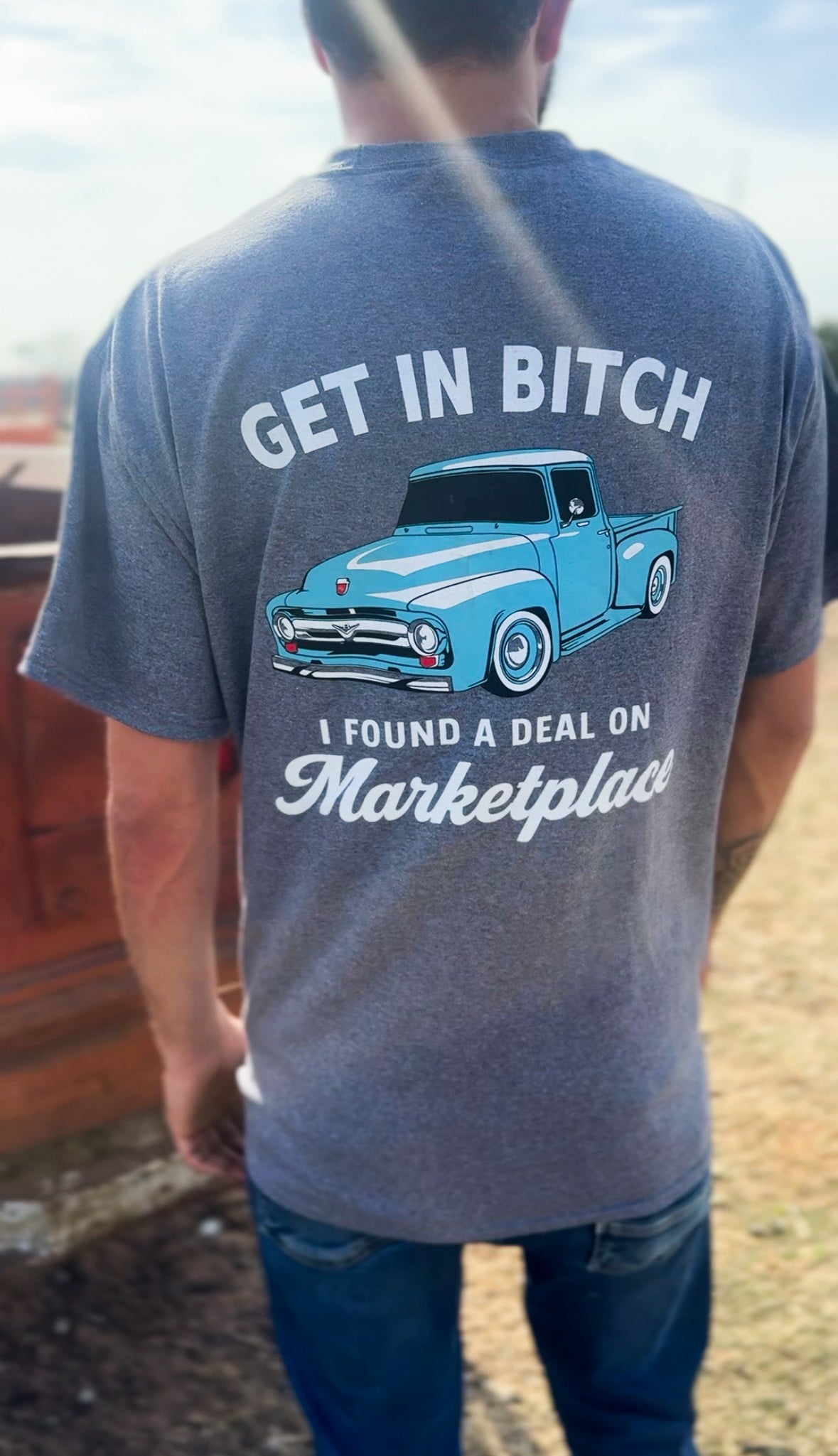 Shop Karma Tees "Get in Bitch, I found a deal on Marketplace" graphic t-shirt, front view showing bold text and casual fit.