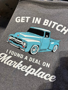 Shop Karma Tees "Get in Bitch, I found a deal on Marketplace" Ford-themed graphic t-shirt displayed on a mannequin.