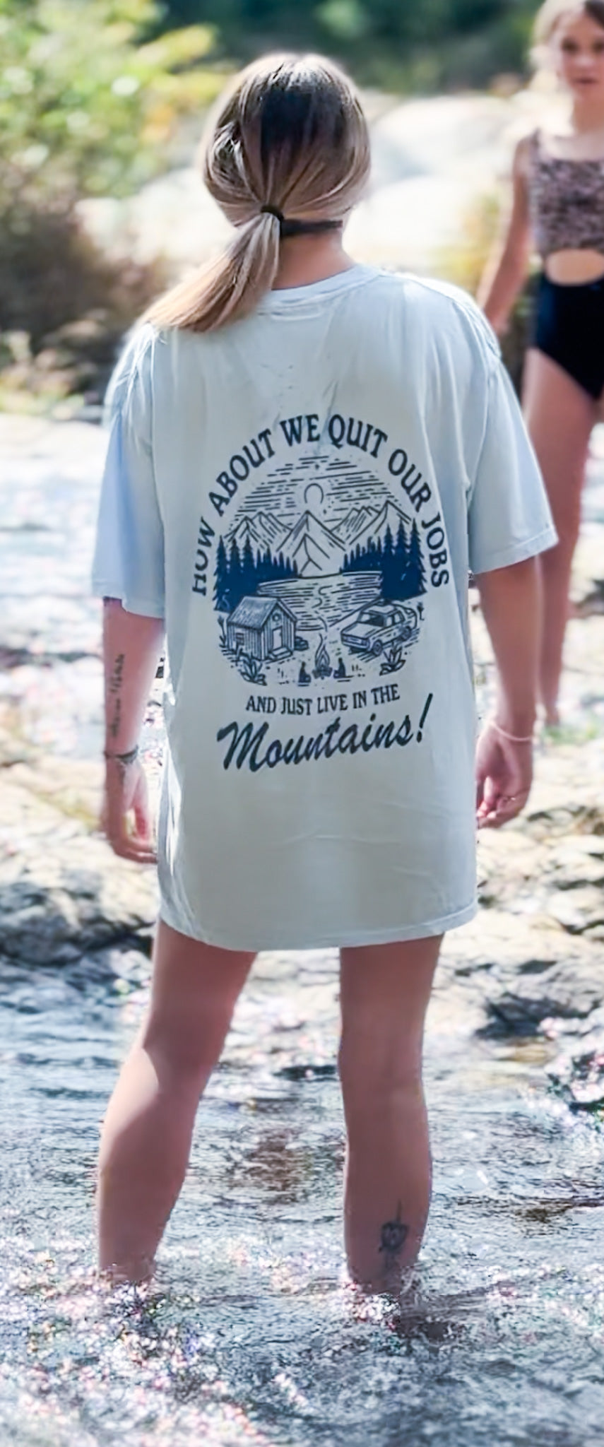 Let's Quit Our Jobs graphic T-shirt by Shop Karma Tees, featuring bold text design on a casual cotton tee.