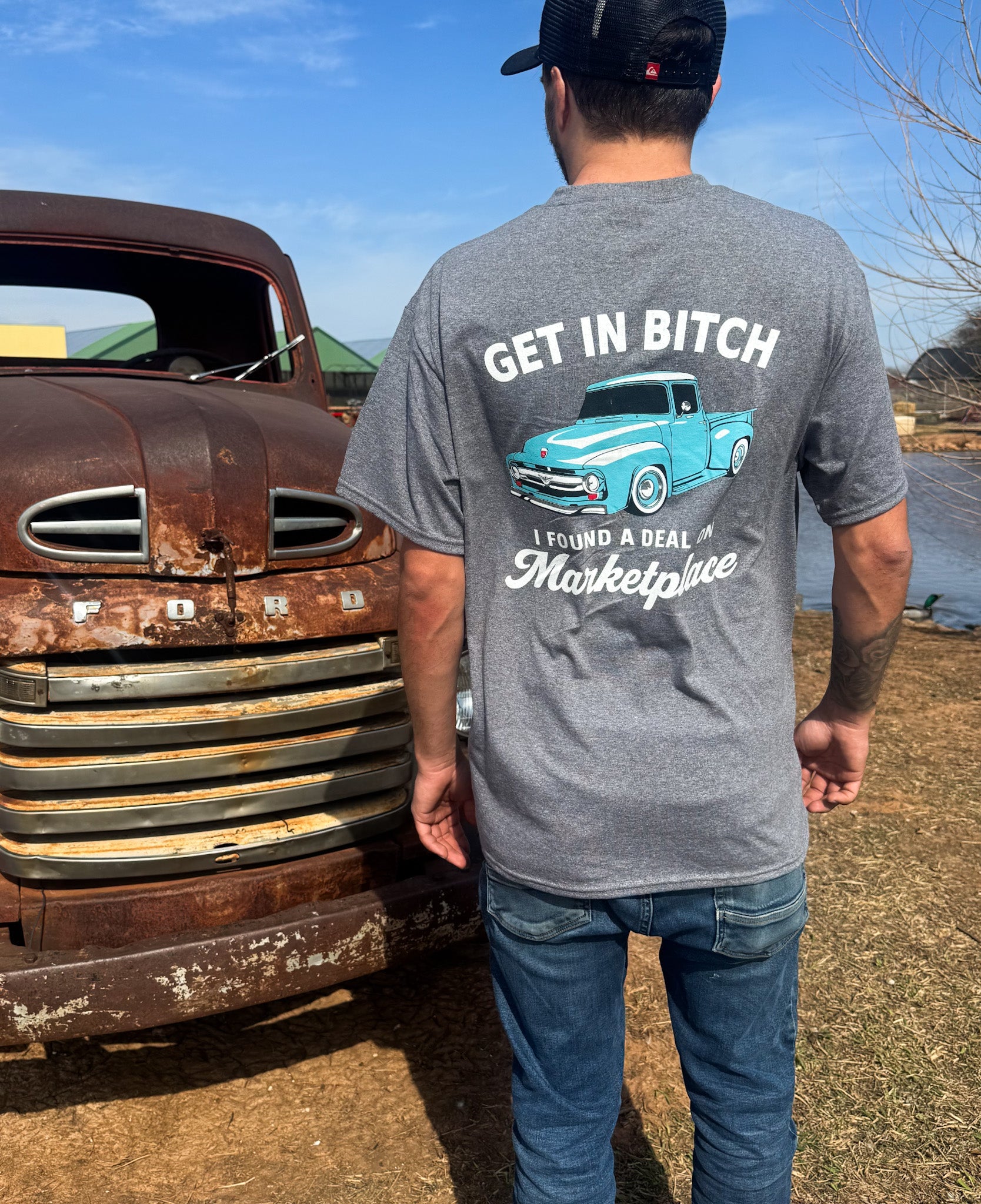 Ford-themed T-shirt from Shop Karma Tees with humorous "Get in Bitch, I found a deal on Marketplace" design, casual clothing style.