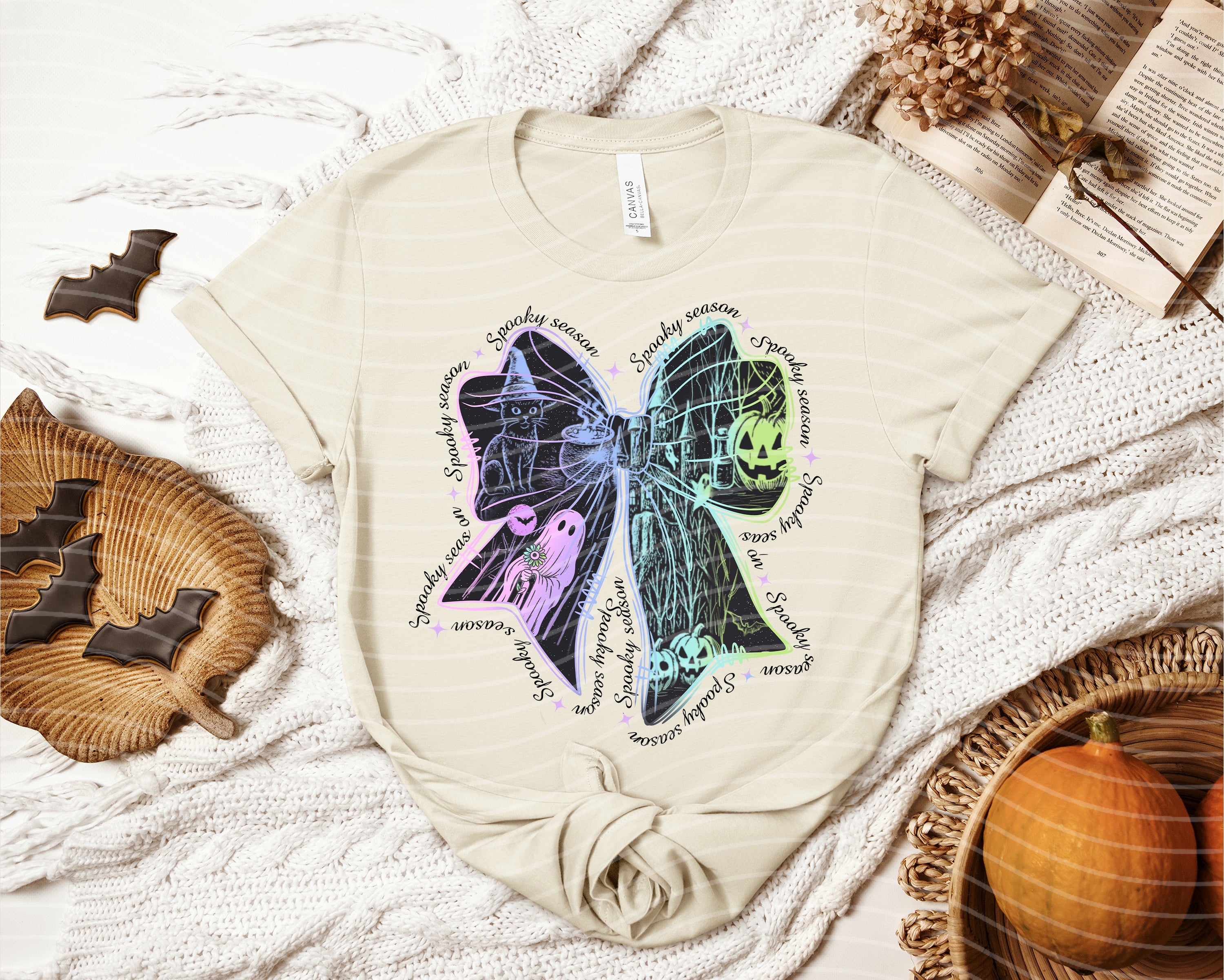 Spooky Season Bow Graphic Tee by Anchored Grace Boutique featuring a playful Halloween-themed bow design on a casual graphic tee.