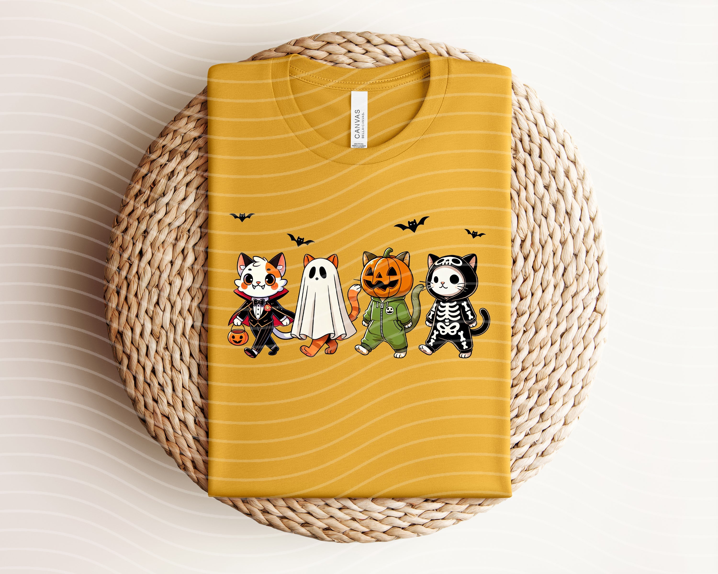 Spooky Cats graphic tee from Anchored Grace Boutique featuring a playful cat design on a casual cotton t-shirt.