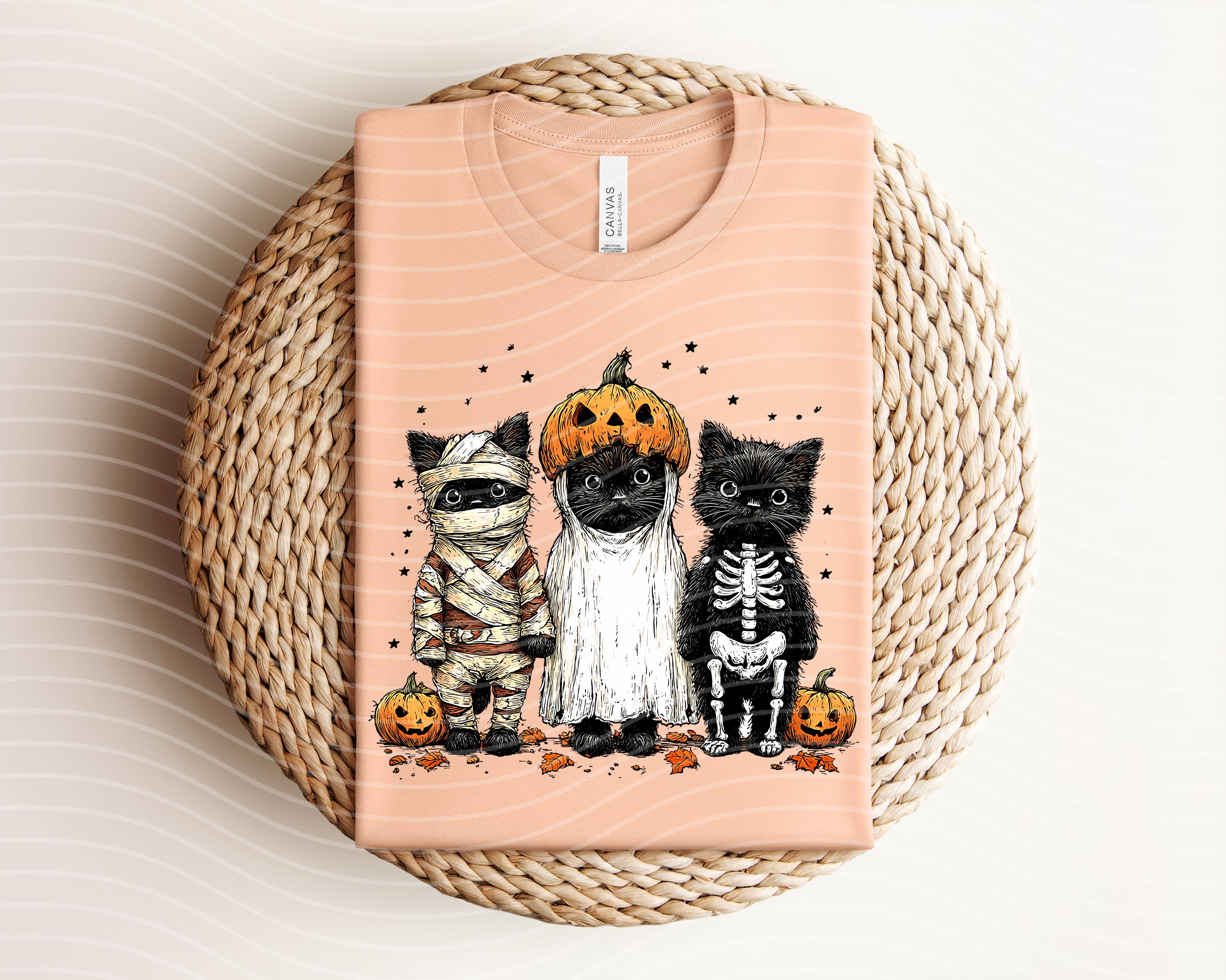 Spooky Cats graphic tee by Anchored Grace Boutique featuring a fun cat design on soft fabric for casual wear.