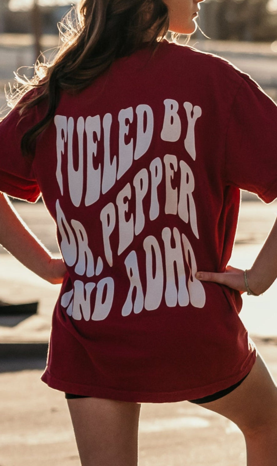 Graphic T-shirt featuring Dr. Pepper and ADHD designs, vibrant print on a casual unisex tee by Shop Karma Tees.