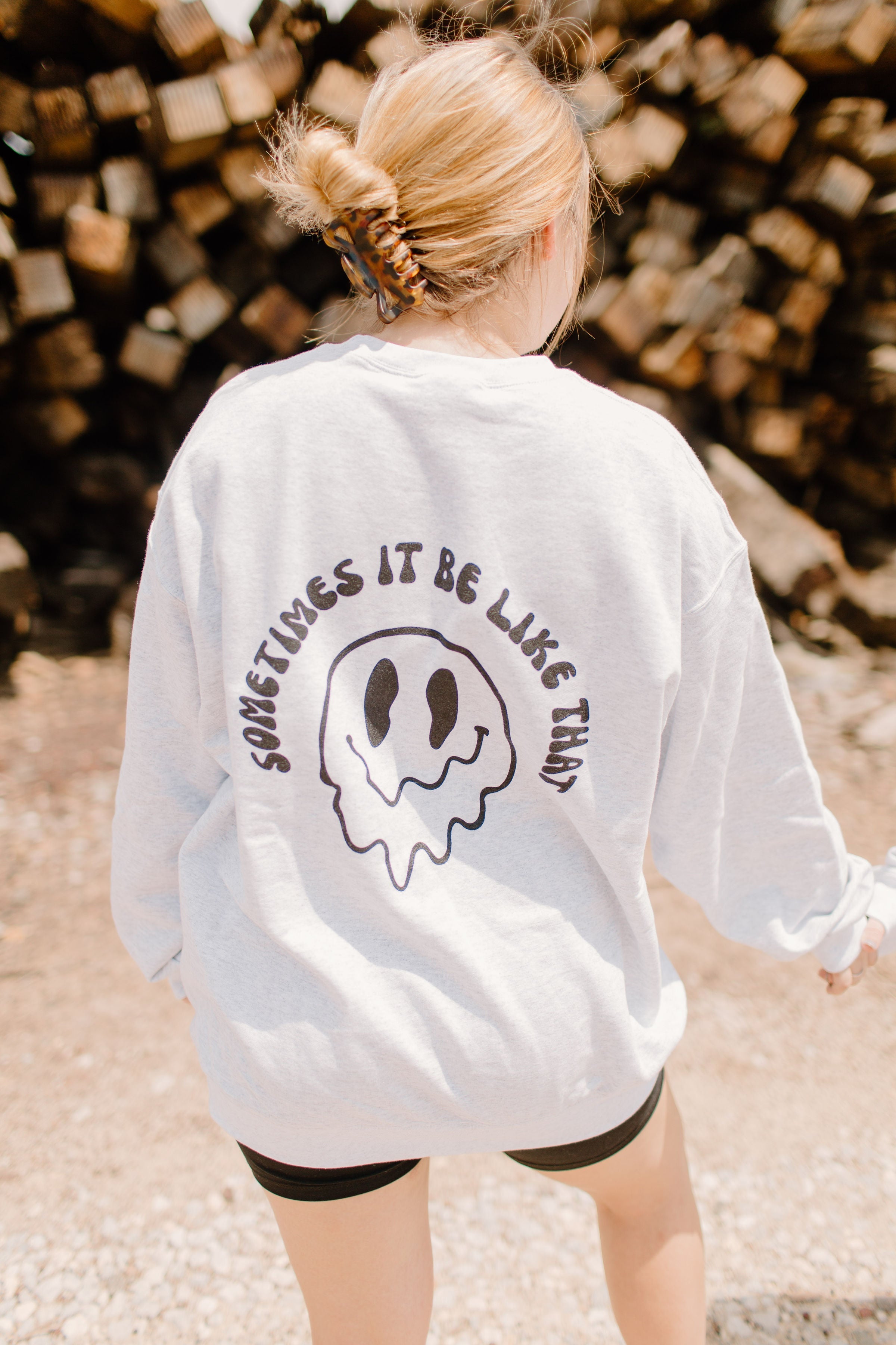 Cream-colored crewneck sweatshirt from Shop Karma Tees with "Sometimes it be like that" graphic design on front.