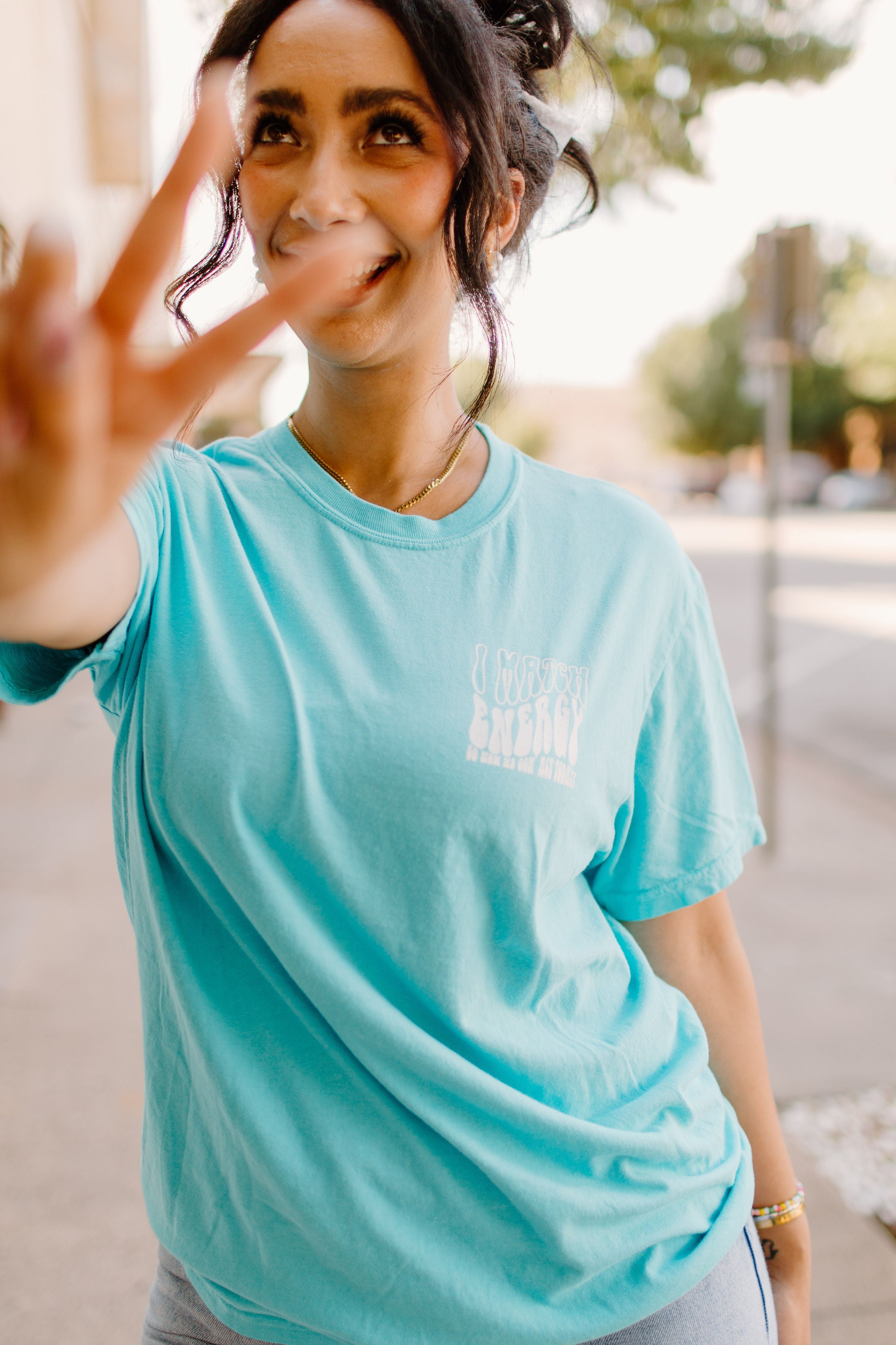 Black I Match Energy graphic T-shirt by Shop Karma Tees featuring bold text and vibrant design on soft cotton fabric.