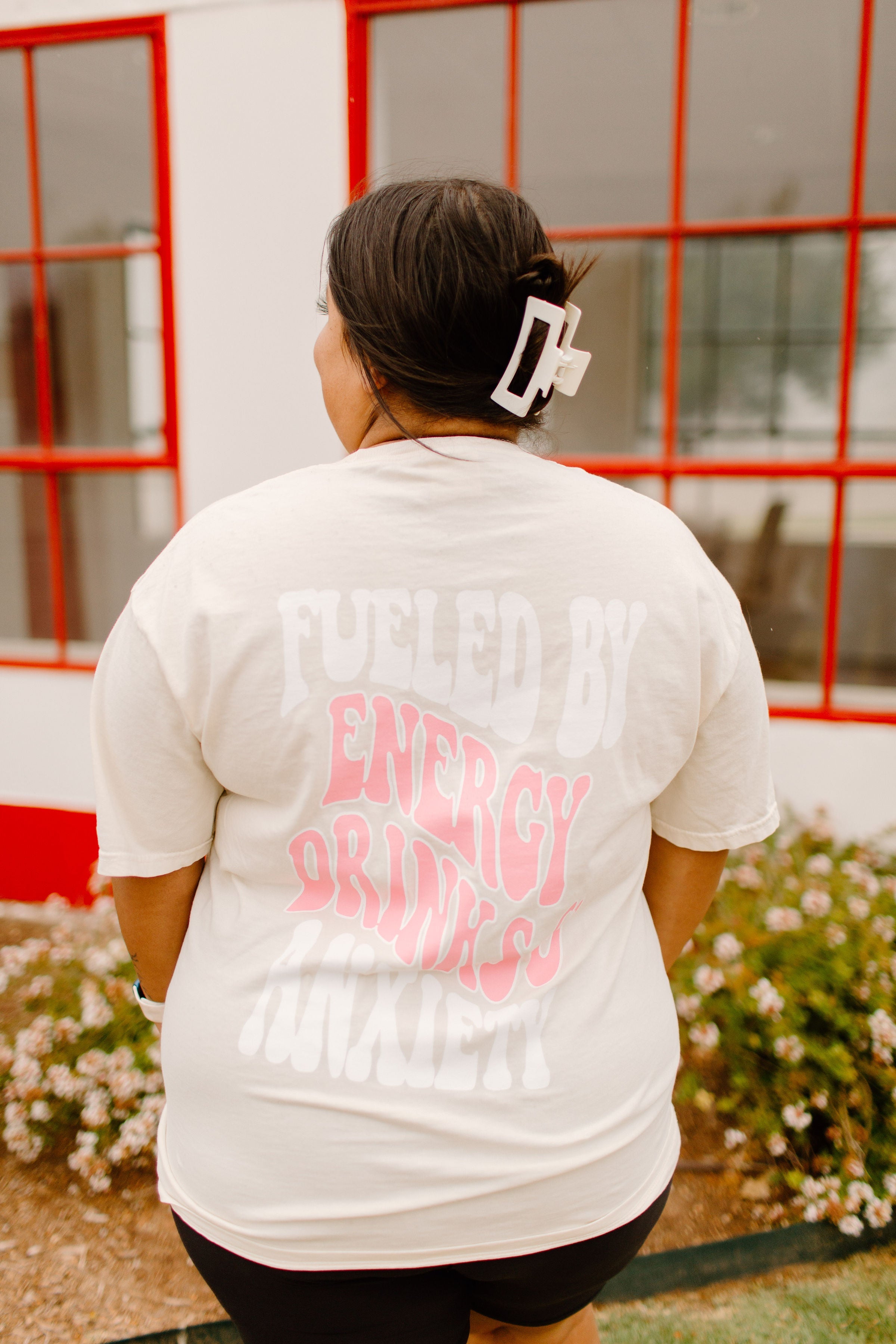 Graphic tee featuring "Fueled By Energy Drinks and Anxiety" text, casual fit, Shop Karma Tees branding visible in the image.