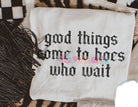 Black graphic tee from Anchored Grace Boutique with bold white text that reads "Good Things Come to Hoes Who Wait."