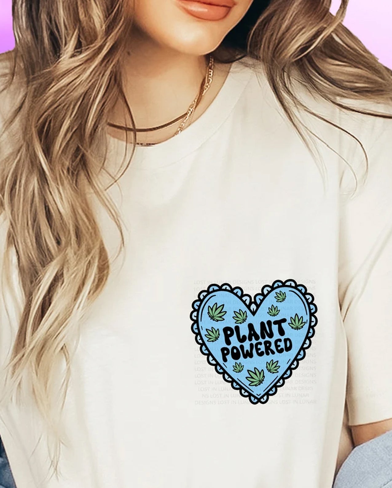 Plant Powered graphic tee by Anchored Grace Boutique featuring a vibrant, nature-inspired design on a casual cotton t-shirt.