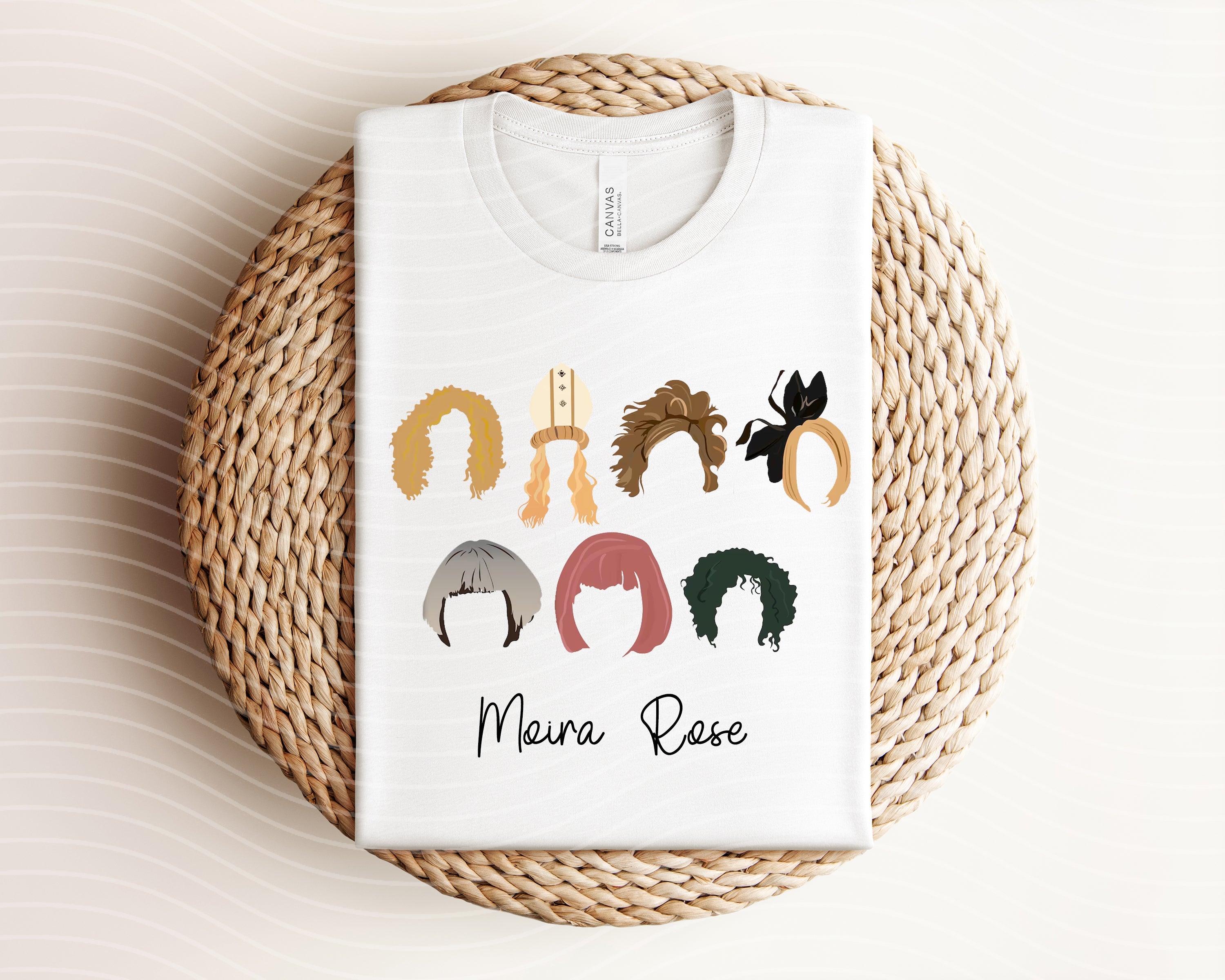 Moira Rose graphic tee by Anchored Grace Boutique featuring a stylish, colorful design on a casual cotton t-shirt.