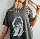 Black and white graphic tee by Anchored Grace Boutique featuring bold artwork on a casual cotton t-shirt.
