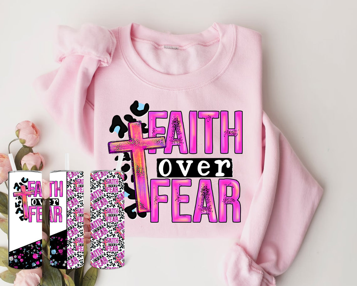 Faith Over Fear graphic tee by Anchored Grace Boutique, featuring a stylish design with inspiring text on a casual t-shirt.