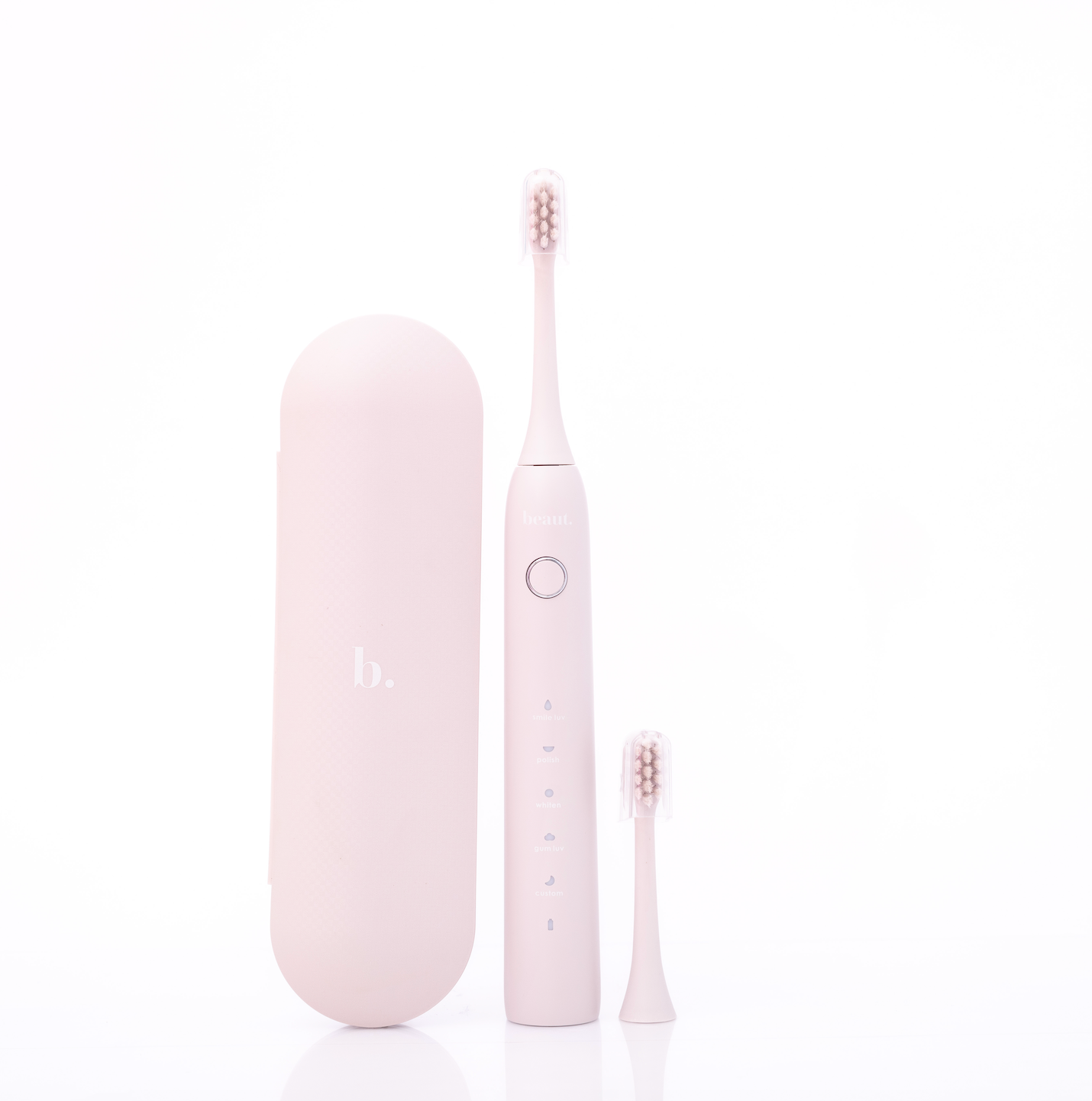 Beaut.beautyco. Smile Luv toothbrush with white handle and colorful bristles, designed for gentle, effective oral cleaning.