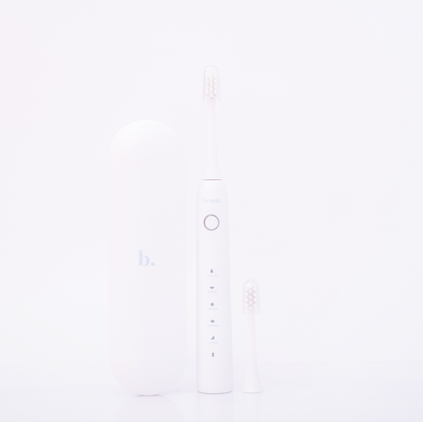 Beaut.beautyco. Smile Luv toothbrush with colorful bristles and ergonomic handle, designed for effective oral cleaning.