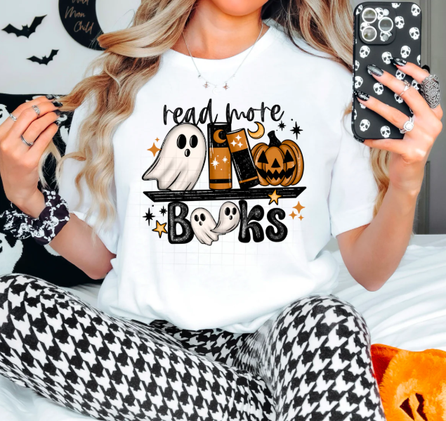 Graphic tee featuring "Read More Books" design by Anchored Grace Boutique, casual apparel for book lovers.