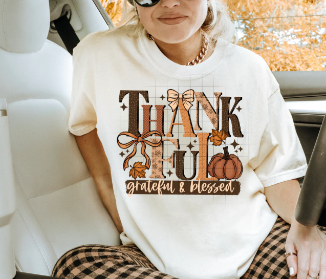 Thankful, grateful, and blessed graphic tee by Anchored Grace Boutique featuring inspirational text on a casual t-shirt.
