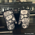 Set of 2 Kitchen Witch oven mitts and pot holders from The Bullish Store, hanging oven gloves with witch design, heat-resistant fabric