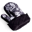 Set of 2 Kitchen Witch oven mitts and pot holders from The Bullish Store, hanging oven gloves with decorative witch design.