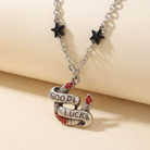 Sourpuss "Good Luck" horseshoe necklace featuring red rhinestones and black star charms, stylish jewelry gift accessory